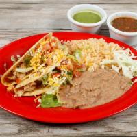 Crispy Tacos Plate · 2 Crispy corn tacos with choice of meat, beans, lettuce, sour cream, salsa fresca and cheese.
