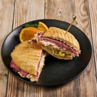 Pastrami Sandwich · Pastrami with coleslaw, pepperoncini and Russian dressing on a country Italian roll.