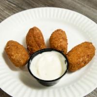 8 Pieces Jalapeno Poppers · Deep fried breaded jalapenos stuffed with cheese and spices. Spicy.