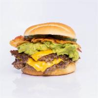 Dream Burger · Double smash patty with American cheese, lettuce, mayo, double pickles & extra bacon, topped...