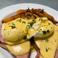 Classic Benedict · Piled with Canadian bacon, tomato and housemade hollandaise on english muffin | Served with ...