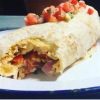 Breakfast Burrito · Scrambled egg, chorizo, pepper jack, potato, tomato, sour cream, and pico de gallo 
*Served ...