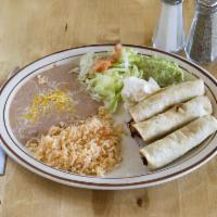 3 Flautas · Rolled deep fried corn tortillas filled with chicken or shredded beef. Served with sour crea...
