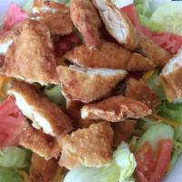 Crispy Chicken Salad · Crisp lettuce with crispy chicken, hard boiled egg, onions, cucumbers, tomatoes and cheddar ...