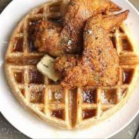Chicken and Waffles · Buttermilk fried chicken tenders served a top a golden Belgian waffle, smothered in maple co...