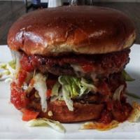 Italian Burger · ½ lb. fresh steak burger with herb mayo, mild/hot giardiniera on a bed of lettuce, tomato an...