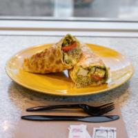 Chicken Wrap on the Grill Sandwich · Grilled tortilla with chicken breast, avocado, cheese, sprouts, tomato, pepperoncinis and on...
