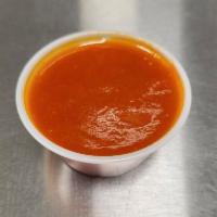 Honey Sriracha Sauce (2oz) · We use a blend of real honey and Sriracha to create a delicious spicy and sweet sauce to be ...