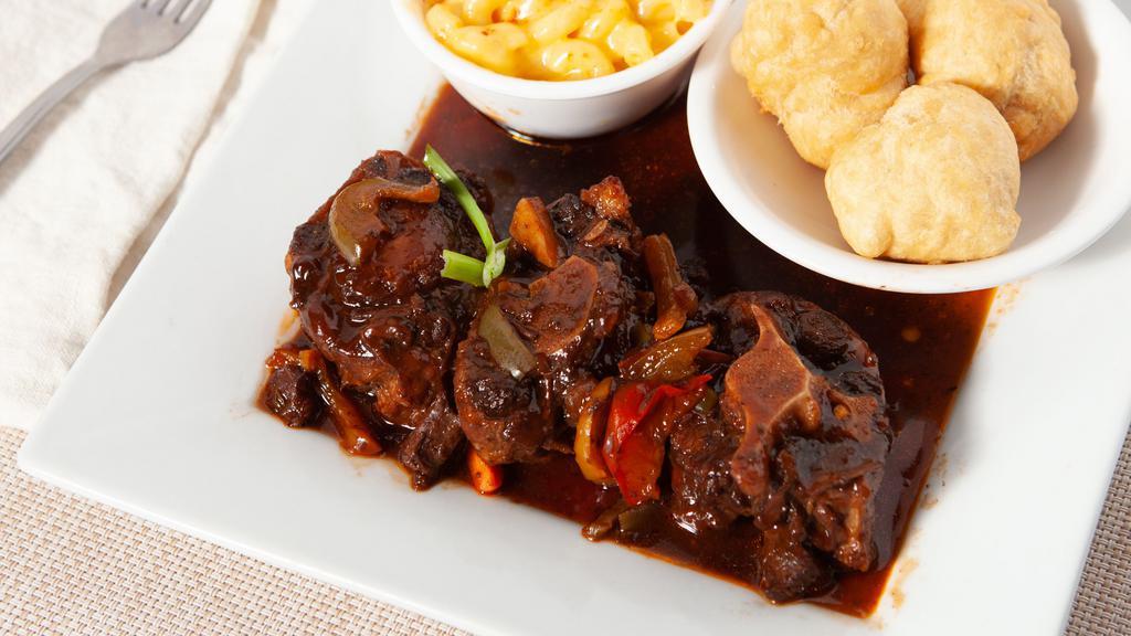 Oxtail Stew · Oxtail is a bony rich meat slow simmered to a flavorful tender succulent treat.