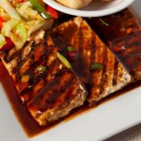 BBQ Tofu Steak · Slices of tofu grilled with our delightful blend of herbs and spices. Gluten free and vegeta...