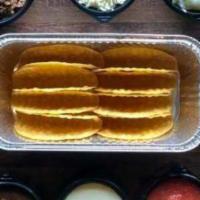 Taco Family Meal · Enjoy 8 Tacos with your choice of Ground beef or pulled chicken. Mexican Rice, Refried Beans...