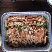 Chicken Fajita Family Meal · Enjoy Our Chicken Family Meal, Includes Mexican Rice, Refried Beans, Lettuce, Sour Cream, Pi...