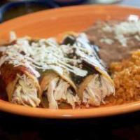Chicken Enchiladas · Red, Green, Mole, or Mixed Stuffed with pulled chicken. Choose from green tomatillo salsa, m...