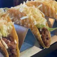 Hard/Soft Shell Tacos · The all-American classic: ground beef or chicken, shredded cheese and lettuce.