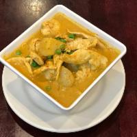 Mild Curry · Yellow mild spicy coconut milk curry with chicken or beef and potatoes, green pea. Gluten fr...