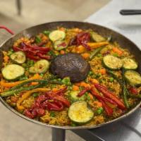 Vegetarian Paellas  · Local seasonal vegetables.
