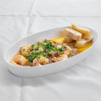 Garlic Shrimp · Jumbo shrimp, pan-fried in butter, garlic, olive oil, and parsley.
