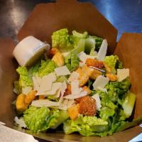 Caesar Salad · Crispy romaine lettuce, Parmesan cheese and croutons.