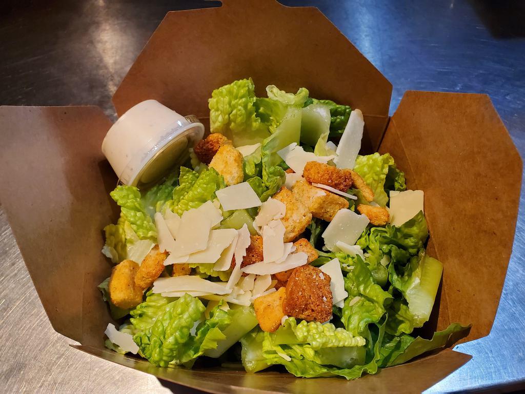 Caesar Salad · Crispy romaine lettuce, Parmesan cheese and croutons.