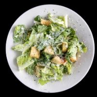 Romaine Caesar Salad · Romaine, fresh grated cheese, croutons and Caesar dressing.
