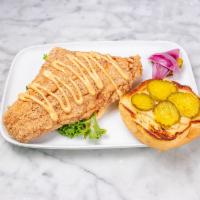 Hot Fried Catfish Sandwich · Our catfish fried in potato starch topped with a spicy remoulade sauce, house-made pickles, ...
