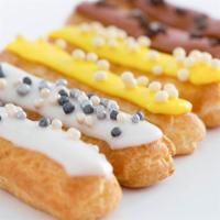 Eclair · A delicious choux pastry filled with flavored pastry cream. Choose from: chocolate, pistachi...