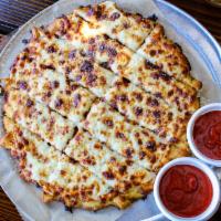 CHEESY BREAD · Hand kneaded dough, brushed with garlic cilantro butter, smothered in mozzarella, topped wit...