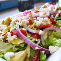 THE GREEK SALAD · Chopped romaine, sun dried tomatoes, roasted red peppers, artichoke hearts, red onions,green...