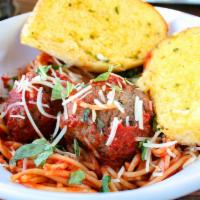 SPAGHETTI AND MEATBALLS · House marinara, spaghetti, and two meatballs served with a side of garlic bread.