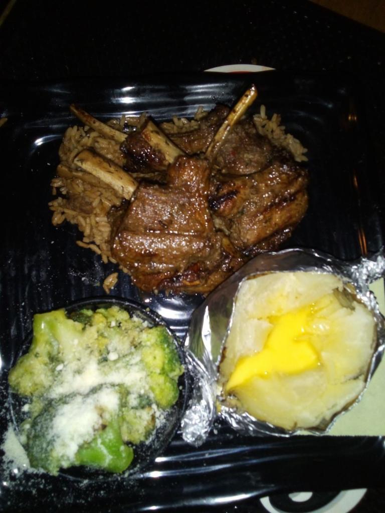 Lamb Chops · Four bone lamb chops pan seared then grilled and served with dirty rice. Served with 2 sides.