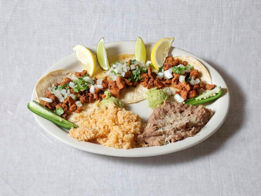 Tacos al Pastor · Served with beans, rice or fideo.