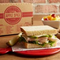 Granny Apple Turkey Executive Sandwich · Honey wheat. Tangy sliced green apples, tender turkey breast, havarti cheese with apple cide...