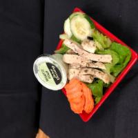 Herb Roasted Chicken Salad · A delicious combination of fresh, crisp salad greens, vegetables and herb
roasted chicken br...