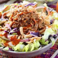 BBQ Pulled Pork Salad · Comes with BBQ ranch dressing. Salad greens topped with BBQ pulled pork, shredded cheddar ch...