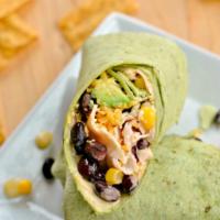 Southwest Chicken Classic Wrap · Grilled chicken, corn, black beans, tortilla strips, lettuce, cheddar cheese and BBQ ranch d...