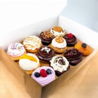 Assorted Dozen Center Filled Box · An assortment of 12 of our center-filled cupcakes.