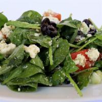 Greek salad  ·  A delicious traditional greek salad with spinach, cucumbers, tomoates, red onions , olives ...
