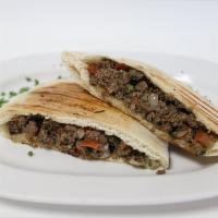 Egyptian Beef Empanadas · Ground beef with tomatoes, onions, cilantro, jalapeño, garlic, olive oil baked in a pita bre...