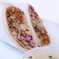 Chicken Shawarma · Roasted thin slices of marinated prime chicken wrapped in a pita sandwich wrap, served with ...