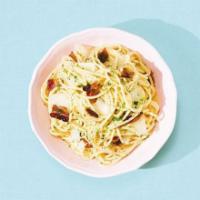 Pasta Carbonara · Spaghetti with pancetta tossed in a carbonara sauce with Parmesan cheese.
