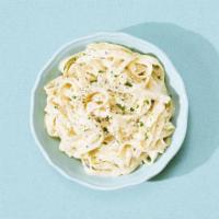 Fettuccini Alfredo · Fettuccine tossed in an Alfredo sauce.