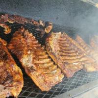 Full Slab of Ribs · Complete Slab with your choice of bbq sauce. Sweet, sweet and spicy or regular