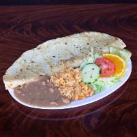 Pastor Quesadilla · Hand made quezadilla with monterrey jack cheese served with rice and beans.(optional)