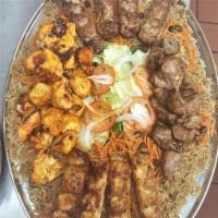 14. Family Combo for 5-6 People · Medium Family Combo*This combo is served with 11 mixed kababs, large tray rich flavorful Ric...