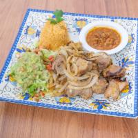 Carnitas Mexicanas Plate · Deep-fried, juicy pork tips seasoned in our martin secret juices. Served with Mexi-rice, cha...