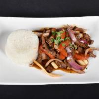25. Lomo Saltado · Stir fried sirloin tip steak sauteed with soy sauce wine, onions, green peppers and tomatoes...