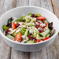 Pesto Salad · Spring mix, romaine, cucumbers, baby tomato, dried cranberries, almonds and basil pesto dres...