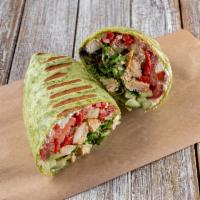 Pesto Chicken Wrap · Baby greens, romaine, cucumber, tomato, roasted peppers, feta cheese, chicken breast, basil ...
