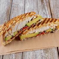 Chipotle Chicken Avocado Panini · Chipotle sauce, roasted peppers, chicken breast, avocado slices, pepper-jack cheese and blac...