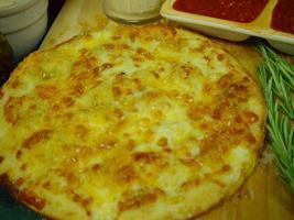 Cheesy Cheese Bread · Brushed with Garlic Infused Olive Oil, topped with
Mozzarella, Cheddar and Parmesan Romano ...